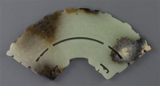 A Chinese archaistic jade fan shaped plaque, W. 14.7cm